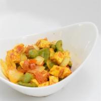 Paneer Balti · Home-made cheese cooked with roasted onion, green pepper,herbs and spices