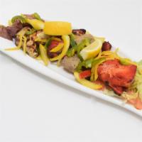 Tandoori Mixed Grill · Combination of sizzling tandoori specialties like chicken tikka tadoori, lamb boti kebab, se...