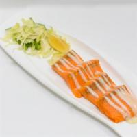 Salmon Kebab · Fresh salmon marinated our chef's secret recipe sauce then baked in our tandoor.