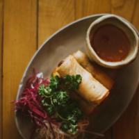 Crispy Vegetable Spring Rolls · 3 rolls served with Thai sweet chili sauce.