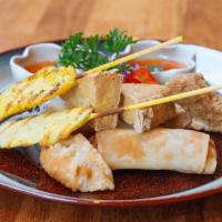 Sampler · Assortment of Appetizers: crispy spring rolls, chicken dumplings, fried tofu, and chicken sa...