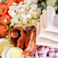 Cobb Salad · romaine lettuce, sliced turkey, tomato, bacon, hard boiled egg, onion, cucumber, carrot & bl...