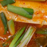 Kimchi Stew · Spicy stew made with ripened kimchi, pork and tofu.