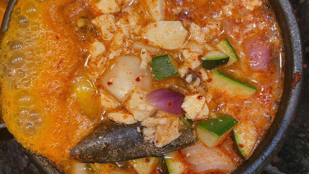 Spicy Soft Tofu Stew · Spicy stew containing soft tofu, seafood and egg.