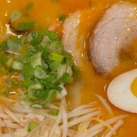 Tonkotsu Curry Straight Noodle · Pork chashu, egg, green onion and bean sprouts.