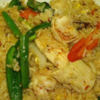 Basil Fried Rice*** · Fried rice with shrimps, chicken, egg, green beans, red pepper, onions, hot pepper, and basi...