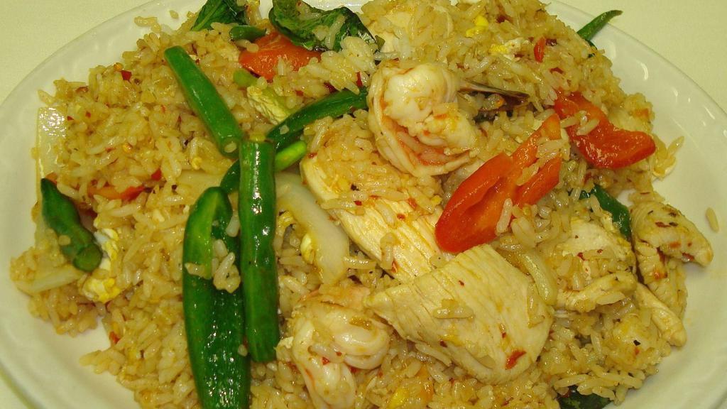 Basil Fried Rice*** · Fried rice with shrimps, chicken, egg, green beans, red pepper, onions, hot pepper, and basil leaves. ***Very hot and spicy.