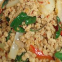 Ka Prow Kai*** · Stir-fried ground chicken in Thai style chili sauce with red pepper, onion, Mexican pepper a...