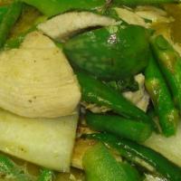 Erawan Curry*** · Sauteed of sliced chicken or beef in spicy green chili sauce with green bean, asparagus, gre...