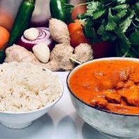 Butter Chicken Masala · home marinated tandoori boneless chicken shredded and slow cooked in a creamy tomato and oni...