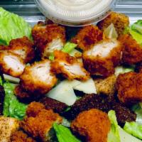 Chicken Tenders Salad · Crispy breaded chicken tenders/ buffalo tenders on Greek, or caesar salad.