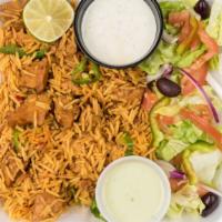 Chicken Biryani · Long grain rice and boneless chicken cooked with lahori exotic spices.