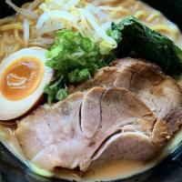 Yakibuta Ramen · Ramen noodle soup topped with tender cha-shu pork, boiled egg, yu-choy, bean sprouts and sca...