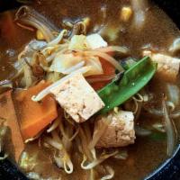 Vegetarian Ramen · Ramen noodle soup with tofu, cabbage, carrots, snowpeas, corn, bean sprouts in veggie broth.