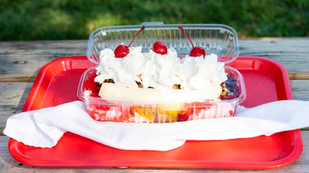 Banana Split · Your choice of ice cream, sliced banana, pineapples, strawberries, crushed cherries and wet walnuts. Includes chocolate syrup, whipped cream and a cherry.