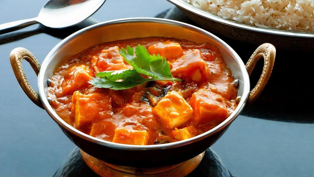 Paneer Tikka Masala · Cubes of cottage cheese in hearty tomato onion sauce rich with cumin, coriander, ginger and fenugreek.