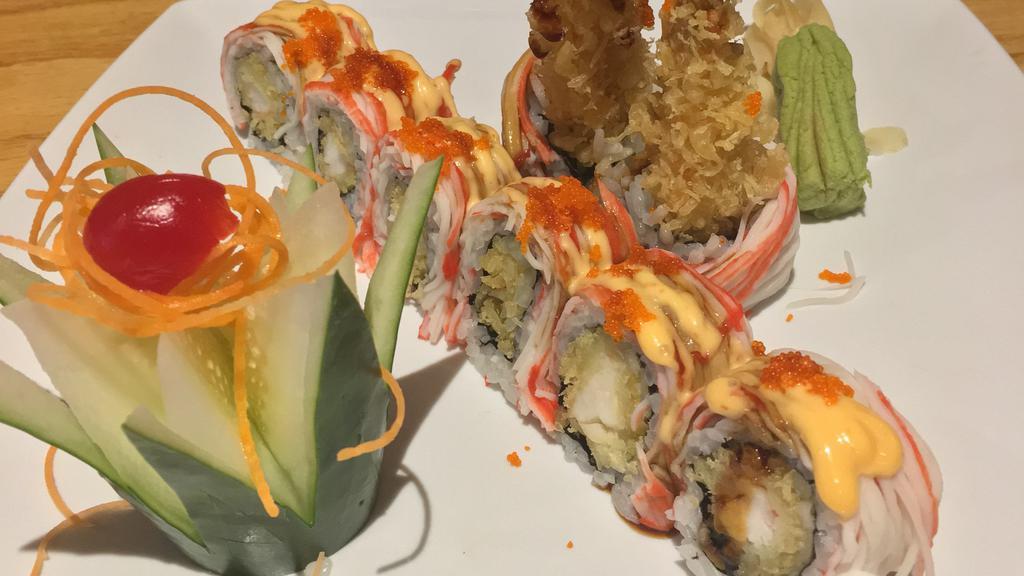 Sunny Roll · Shrimp tempura, cucumber inside with spicy crab and caviar on top.