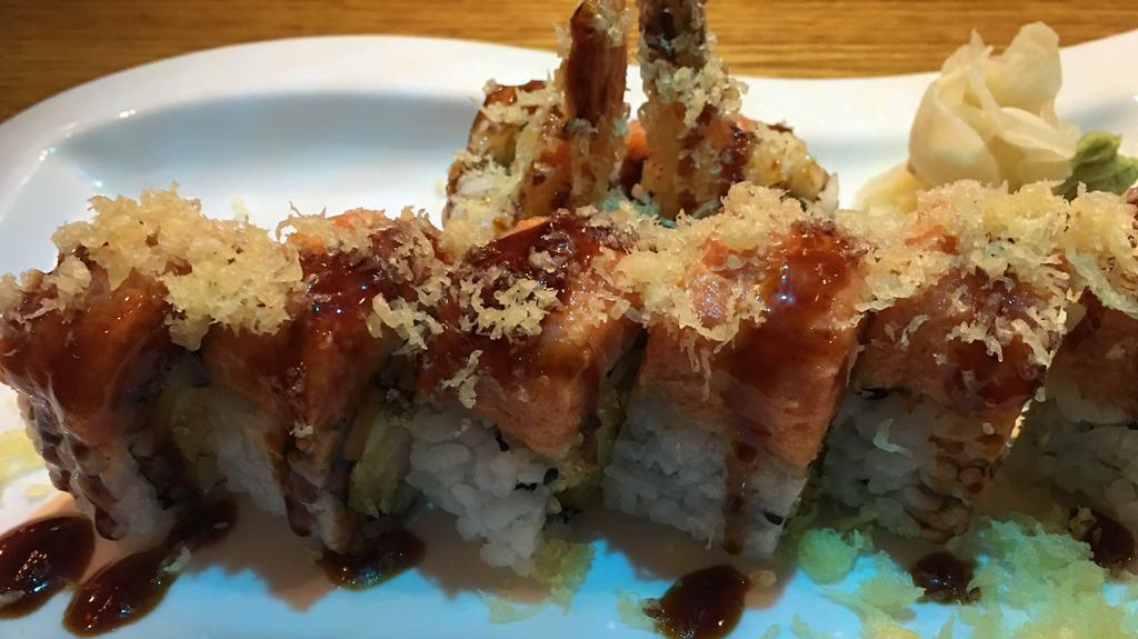 Volcano Roll · Shrimp tempura, cucumber inside with spicy tuna and crunch on top.