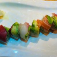 Rainbow Roll · Crab, cucumber and avocado inside with raw fish outside.