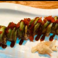 Dragon Roll (Cooked) · Eel, cucumber inside with avocado and caviar on top.