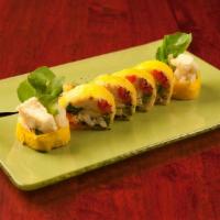Sunrise Roll · Shrimp Tempura, avocado topped with spicy salmon and mango with mango sauce