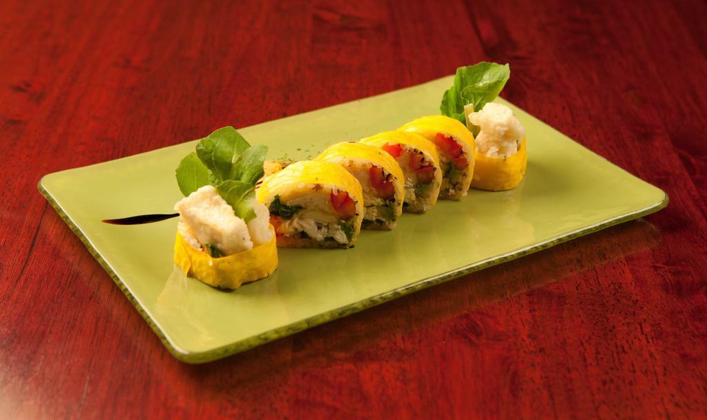 Sunrise Roll · Shrimp Tempura, avocado topped with spicy salmon and mango with mango sauce