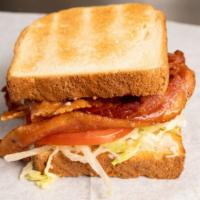 Blt Sandwich · Mayo, lettuce, tomato, bacon with coleslaw, chips and pickle.