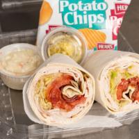 Turkey Club Wrap · Lettuce, tomato, bacon and mayo. Served with coleslaw, chips and pickle.