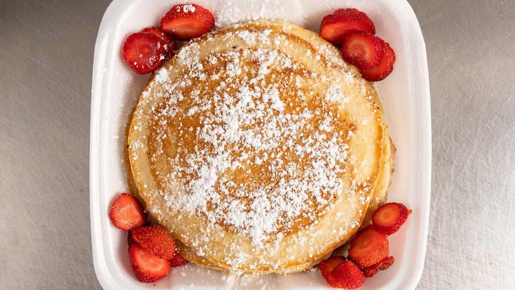 Pancake Platter · Three fluffy pancakes, home fries, syrup and butter. Add fresh fruit for an additional charge.