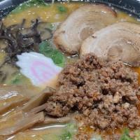 Spicy Miso Ramen · 2 pieces of charsiu, fish cake, spinach, bamboo,woodear mushroom scallions and spicy ground ...