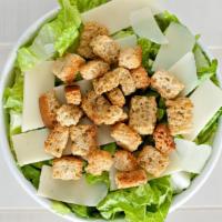 Ceasar · Romaine Lettuce, Shaved Parmesan Cheese, Homemade Croutons, mixed with Caesar Dressing