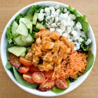Buffalo · Romaine Lettuce, Tomatoes, Carrots, Cucumbers, Crumbled Blue Cheese, and Buffalo Chicken, mi...