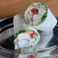 Chicken Bacon Ranch Wrap · Romaine Lettuce, Tomatoes, Cheddar Cheese, Bacon, and Chicken, mixed with Ranch Dressing on ...