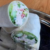 Tuna Wrap · Romaine Lettuce, Tomatoes, Red Onions, Pickles, and Tuna Salad on a White Wrap