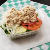 Albacore Tuna Salad · Romaine lettuce, tomatoes, onions, cucumbers, and green peppers topped with albacore tuna sa...