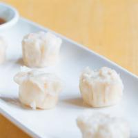 Shrimp Shumai · Steamed shrimp dumplings; sesame and light soy vinaigrette.
