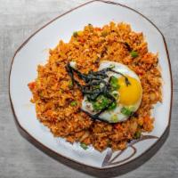 Kimchi Fried Rice · Fried rice with Kimchi and mixed vegetable topped with egg (Spicy)