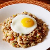 Chicken Fried Rice · Fried rice with chicken and mixed vegetable topped with egg