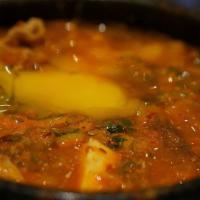Kimchi Jigae · Kimchi, pork, and tofu stew (spicy).