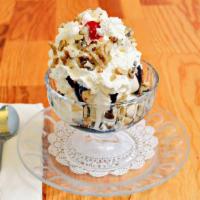 Hot Fudge Sundae · Two scoops of  ice cream, hot fudge, whipped cream and walnuts.
