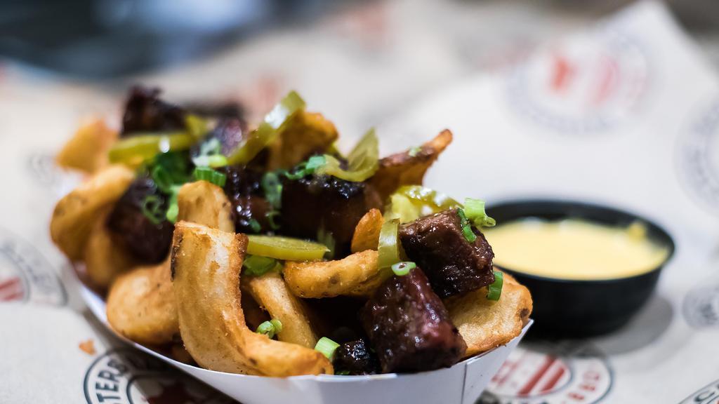 Loaded Texas Sidewinders Fries · Cheese, pickled jalapenos, burnt ends and scallion.