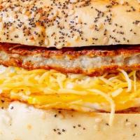 Sausage Egg & Cheese · Grilled sausage patty on top of two fried eggs with cheese on your choice of available bread...