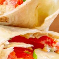 Hummus Wrap · Hummus, cucumber, tomato and lettuce wrapped up in a soft flour tortilla.  Add chicken for a...