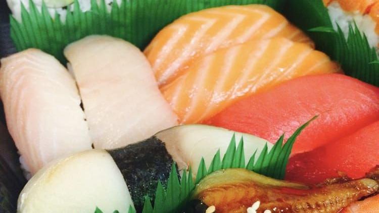 Jd10. Sushi Sashimi Combo · Four sushi, 15 sashimi, one California.