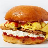 On The Farm · Fried Green Tomato, Whipped Goat Cheese, Ketchup, Soft Scrambled Eggs, Brioche Bun.