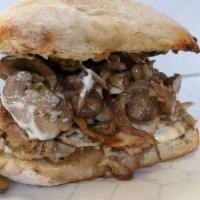 Truffle Pig · A pinkies up kind of porchetta sammie. Our standard 6 oz. of Porchetta topped with a mixture...