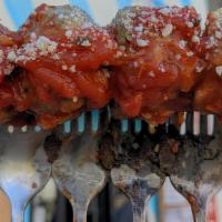 Side Of Meatballs · 6 meatballs with meat sauce and parm in a cup, hot and all for your enjoyment...no bread nee...