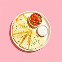 Quesadilla · Pan seared flour tortilla with our signature cheese blend and your choice of filling.