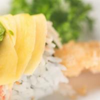 Snow Mountain Maki · Shrimp tempura topped with kani, mayonnaise layer of avocado & mango.                       ...