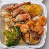 Dungeness Crab & Large Shrimp · Two pieces of dungeness crab and 10 large shrimp.